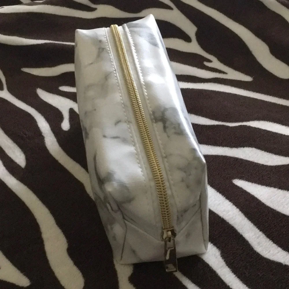 Makeup bag FREE with purchase